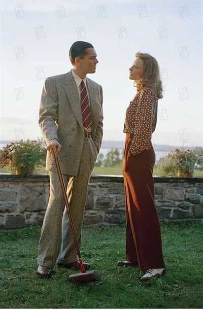 Two players discussing croquet strategy